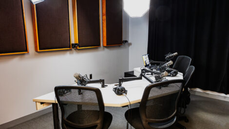a view of the video podcast studio showcasing the cameras, lighting, and audio equipment.